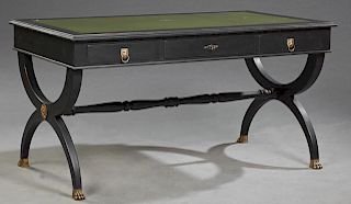 French Empire Style Polychromed Mahogany Desk, c. 1900, the inset tooled green leather writing surface within a stepped top, above three frieze drawer