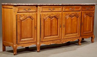 French Louis XV Style Carved Cherry Marble Top Bombe Sideboard, 20th c., the thick stepped highly figured brown marble over two central frieze drawers