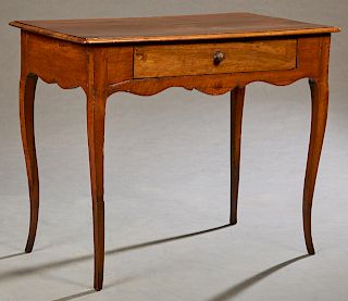 French Provincial Louis XVI Style Carved Cherry Side Table, 19th c., the stepped edge rectangular top over a wide serpentine frieze with a single draw