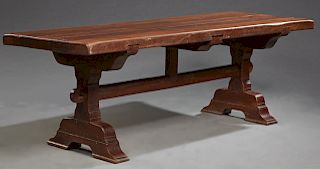 French Provincial Carved Oak Farmhouse Table, 19th c., the thick five plank top, on a trestle base joined by a rectangular stretcher, H.- 29 1/8 in., 
