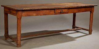 French Provincial Carved Oak Farmhouse Table, c. 1780, the rectangular three board top over a wide skirt, with a frieze drawer at each end, on chamfer