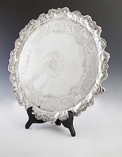 English George III Sterling Silver Salver Tray, 1781, London, by Richard Brown, with a scalloped relief decorated rim around an engraved border and a 
