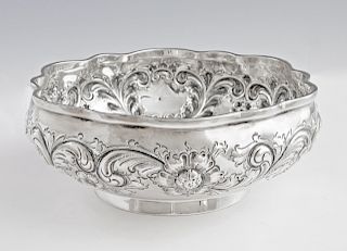Sterling Repousse Serving Bowl, 1902, by Black, Starr and Frost, with a scalopped rim over leaf and floral decoration, the side with a cartouche engra