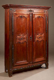 French Louis XV Style Inlaid Carved Oak Armoire, 18th c., the rounded edge ogee crown above double doors with scrolled fielded panels, steel escutcheo
