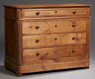 French Louis Philippe Carved Cherry Commode, 19th c., the canted corner top over a frieze drawer and three deep drawers, on a plinth base on block fee
