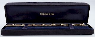 Tiffany and Co. 18K Yellow Gold Link Bracelet, 1995 with eight curved barlinks joined by eight ribbed links, in original black velvet box, H.- 7 in., 