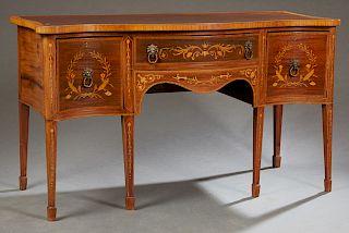 English Georgian Style Inlaid Mahogany Bowfront Sideboard, early 20th c., the serpentine inlaid and banded top over a central frieze drawer flanked by