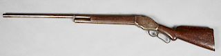 Winchester Lever Action Shotgun, 1895, Model 95, the butt carved "Maxwell," H.- 49 1/2 in., W.- 5 1/4 in., D.- 1 1/2 in.