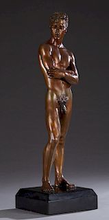Large Patinated Bronze Male Standing Classical Nude, 20th c., on a thick stepped black marble base, H.- 40 in., W.- 11 3/4 in., D.- 11 3/4. Provenance