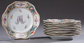 Set of Ten Dresden Porcelain Plates, c. 1901, by Carl Thieme, Potschappel, the scalloped plates with relief and floral decorated reticulated borders, 