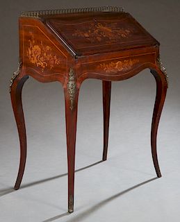 French Marquetry Inlaid Ormolu Mounted Mahogany Bombe Lady's Desk, c. 1900, the top with a 3/4 pierced brass gallery over a slant lit to an interior f