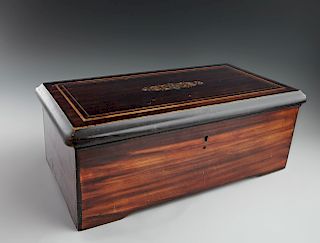 French Inlaid Ebonized Mahogany Music Box, 19th c., with four tunes, lever wind, working, the hinged top, opening to reveal the original list of songs