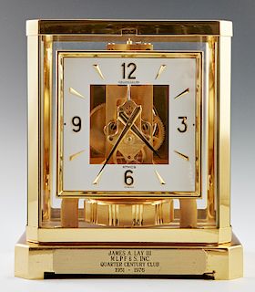 Jaeger LeCoultre Atmos Brass and Glass Mantle Clock, Serial # 438933, 1960-1980, the base with a brass plaque "James A. Lay III, MLPF&S Inc. Quarter C