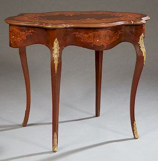 Continental Louis XV Style Marquetry and Mother-of-Pearl Inlaid Ormolu Mounted Mahogany Center Table, c. 1900, the turtle shaped top over a conforming