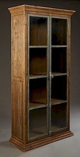 French Double Door Mahogany and Iron Industrial Style Bookcase, 20th c., the stepped crown over iron framed glazed double doors enclosing three shelve