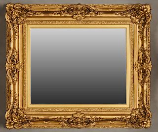 Gilt and Gesso Art Nouveau Style Overmantle Mirror, 20th c., in an elaborate deep relief frame with floral corners, H.- 48 in., W.- 40 in., D.- 5 1/2 