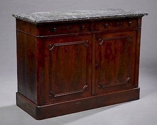 French Louis Philippe Style Carved Mahogany Marble Top Commode, 19th c., the rounded reeded edge highly figured grey marble over two frieze drawers ab