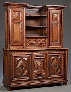 French Provincial Louis XIII Style Carved Oak Sideboard, early 20th c., the breakfront upper section with three center shelves over double cupboard do