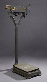 French Brass and Iron Human Platform Scale, c. 1870, marked "F. Mabile, Paris," H. 55 in., W.- 24 in., D.- 25 in.