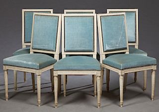 Set of Six French Louis XVI Style Polychromed Upholstered Chairs, c. 1930, with rectangular backs and trapezoidal seats on fluted tapered legs, in blu