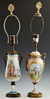 Two French Sevres Style Ormolu Mounted Porcelain Baluster Lamps, early 20th c., with ormolu handles, one with a blue ground painted with a woman in a 