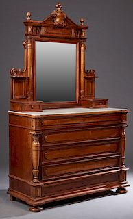 French Henri II Style Carved Mahogany Marble Top Dresser, c. 1890, the peaked fleur de lis crest over a stepped crown above a wide beveled plate flank