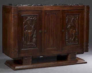 French Carved Walnut Art Deco Marble Top Server, c. 1930, matching previous lot, the highly figured black marble over two cupboard doors carved with r