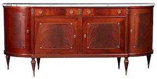 French Louis XVI Style Carved Mahogany Ormolu Mounted Marble Top Sideboard, the stepped figured white marble over two frieze drawers above double cupb
