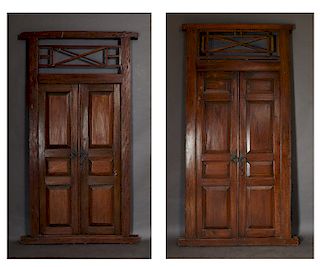 Pair of French Entryway Doors, 20th c., with X-form transoms over double three panel doors, mounted in the original fames, H.- 106 in., W.- 50 in., D.