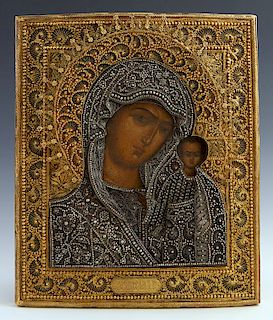 Russian Icon of the Virgin of Kazan, Moscow, first half of the 19th c., with a gilt silver filigree oklad, with a maker's mark of "A.C." in Cyrillic, 