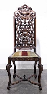 A Renaissance Revival Hall Chair, Height 50 1/2 inches.