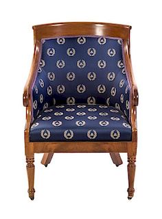 An Empire Style Mahogany Barrel Back Armchair, Height 32 3/4 inches.