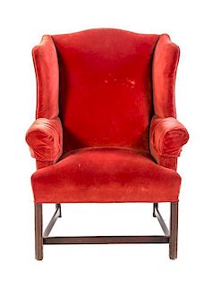 A Georgian Style Wingback Armchair, Height 44 inches.