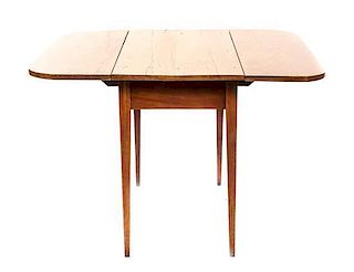 An American Pine Drop-Leaf Table, Height 26 3/4 x width 19 x depth 35 3/4 inches (closed).