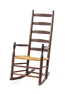 An American Ladder Back Rocker, Height 43 inches.