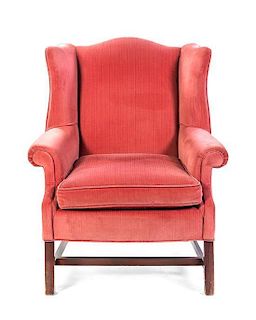 A Georgian Style Wingback Armchair, Height 41 1/2 inches.