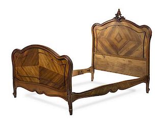A Louis XV Style Walnut Bed, Height of headboard 58 1/2 inches.