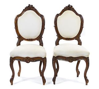 A Pair of Louis XV Style Walnut Side Chairs, Height 40 1/2 inches.