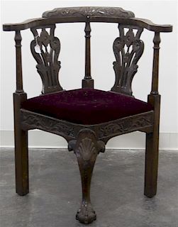 An English Oak Corner Chair, Height 32 1/2 inches.
