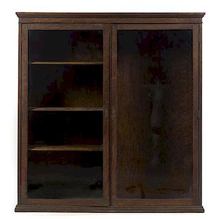 An Arts & Crafts Oak Bookcase, Height 51 x width 48 3/5 x depth 14 inches.