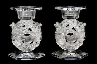A Pair of Lalique Molded and Frosted Glass Candlesticks, Height 6 7/8 inches.