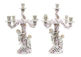 A Pair of Herend Porcelain Five-Light Figural Candelabra, Height 16 1/2 inches.