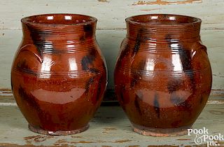 Matched pair of redware crocks