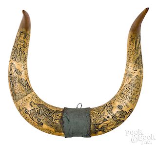 Scrimshaw decorated steer horns