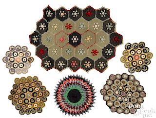 Six penny rug and penny rug style doilies