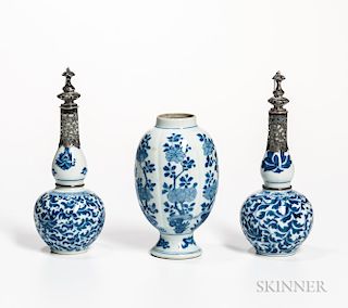 Near Pair of Blue and White Bottle Vases and a Footed Jar