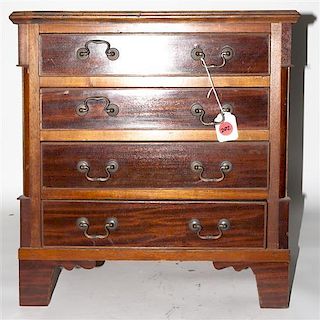 A Diminutive Mahogany Chest of Drawers, Height 21 x width 20 x depth 12 inches.