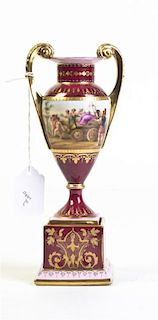 A Royal Vienna Porcelain Urn, Height 8 1/4 inches.
