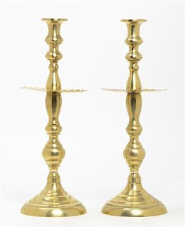 A Pair of Brass Candlesticks, Height 16 inches.