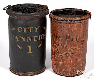 Two American painted leather fire buckets
